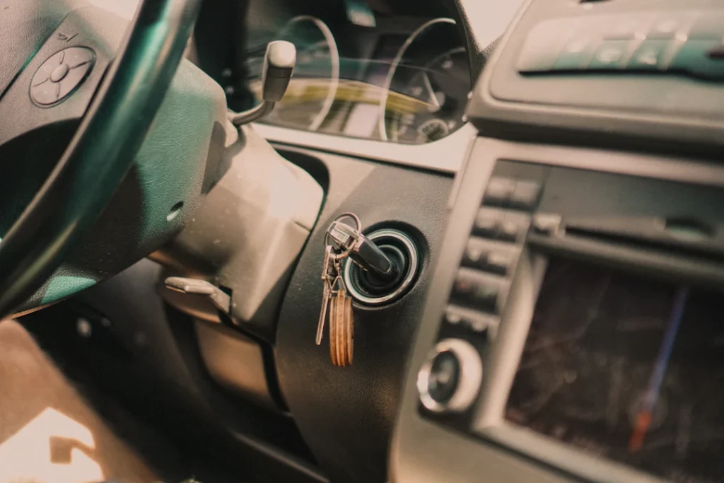 Steering wheel of a car, representing the cost of learning to drive in Manchester
